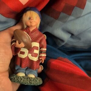 Red Football Player Figurine